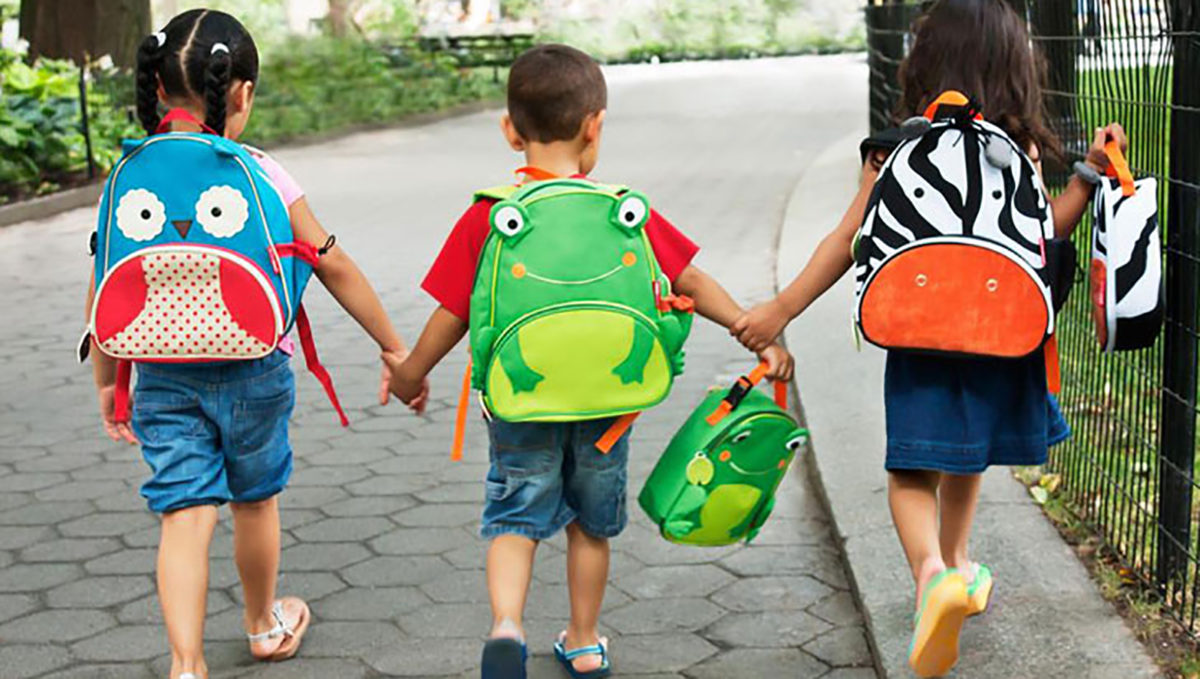 Children wearing backpacks