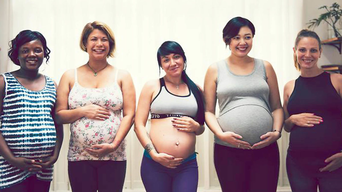 Group of racially diverse pregnant women
